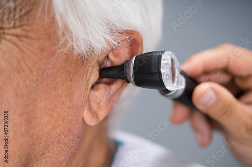 Otolaryngology Check. Doctor Checking Ear