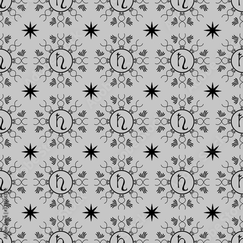 Seamless pattern created by several objects and saturn astrological symbol set to background