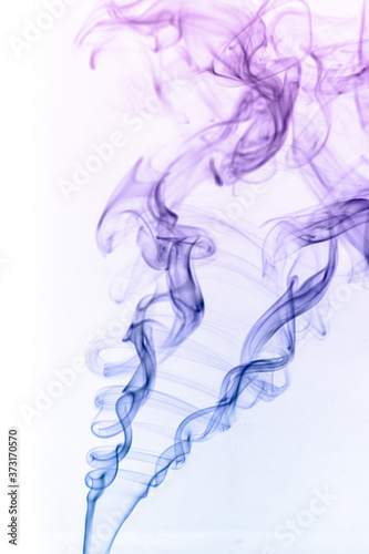 Artistic image of smoke with colour on a white background