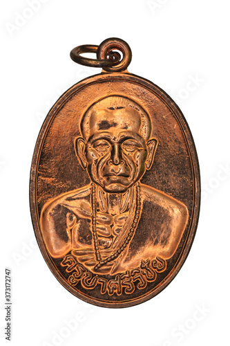 Small Buddha image or Thai amulet isolated on white background.
