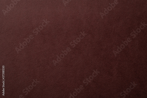 茶色いレザー調のの質感のある紙の背景テクスチャー