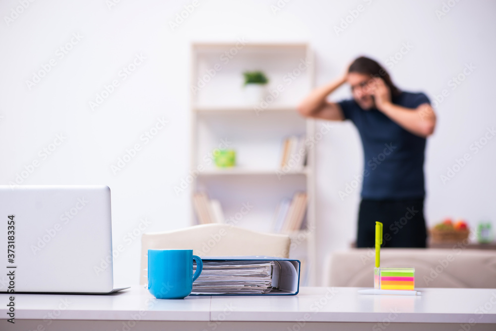Young man employee working from house Young man employee working from house