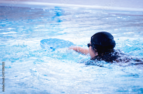 girl learning swimmer © kithanet