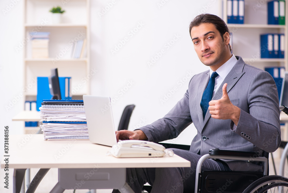 Disabled employee in the office Disabled employee in the office