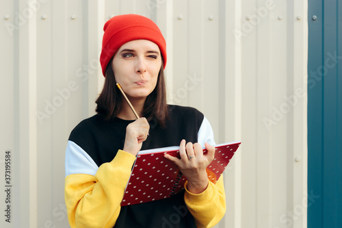 Canvas Print Funny Hipster Woman Writing Something Down in an Agenda