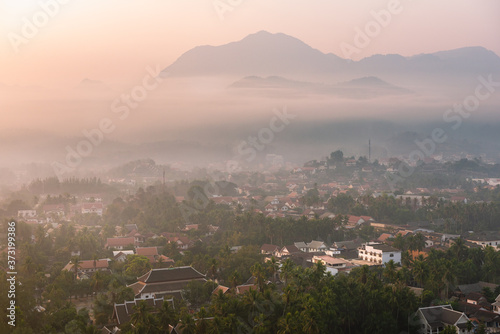 Sunrise and mist over Luang Prabang, Laos from Mount Phousi
