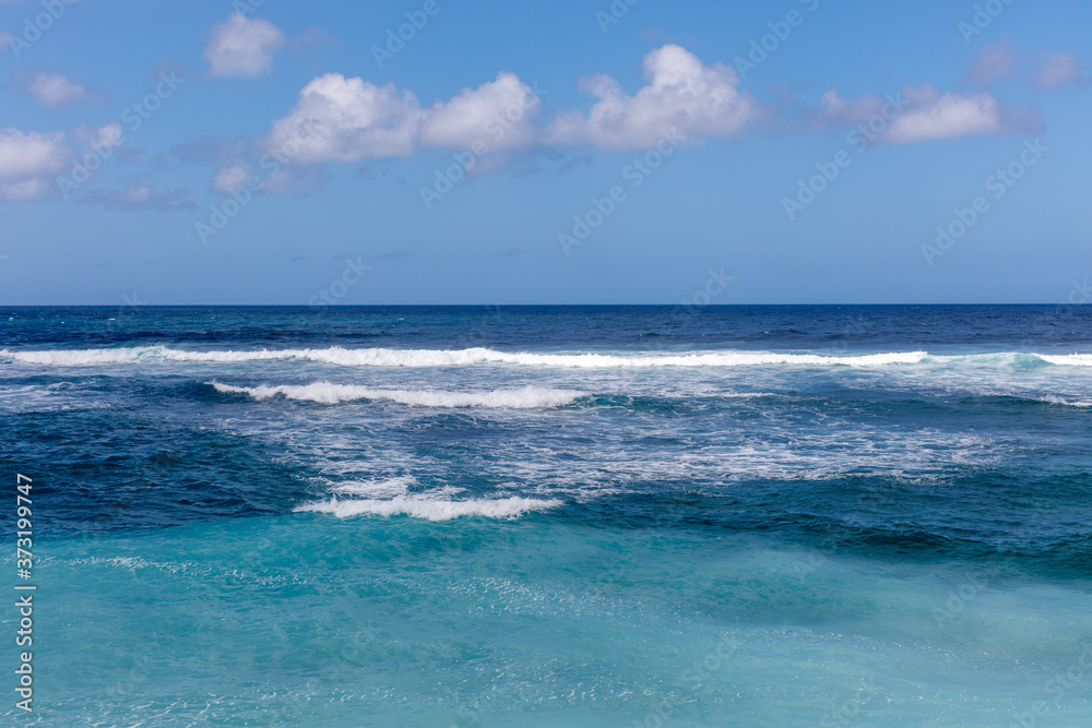 Popular Melasti Beach (Pantai Melasti), Bukit, Bali, Indonesia. Turquoise water, rocks, ocean scenery. Popular Melasti Beach (Pantai Melasti), Bukit, Bali, Indonesia. Turquoise water, rocks, ocean scenery.