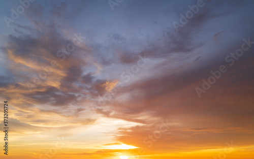 Abstract amazing Scene of stuning Colorful sunset with clouds background in nature and travel concept, wide angle shot Panorama shot.