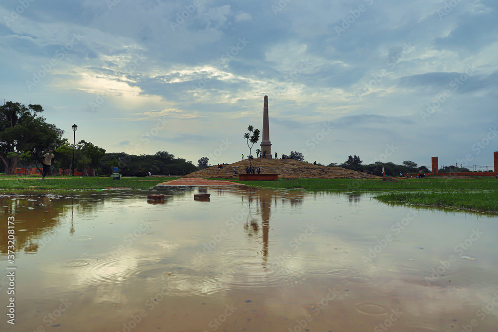 A beautiful scenery of the greenery and reflection in coronation park delhi A beautiful scenery of the greenery and reflection in coronation park delhi