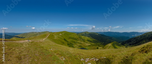 Panoramic view of Carpathian mountains on summer sunny day