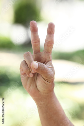 Two-finger illustration photo signifies a peace agreement © Chaidira