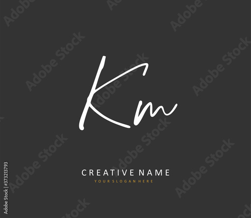 K M KM Initial letter handwriting and signature logo. A concept handwriting initial logo with template element.