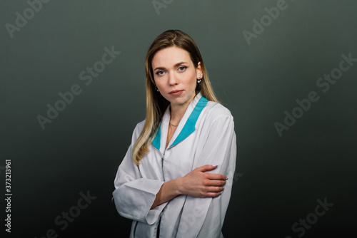 Young beautiful female doctor eady for work in hospital