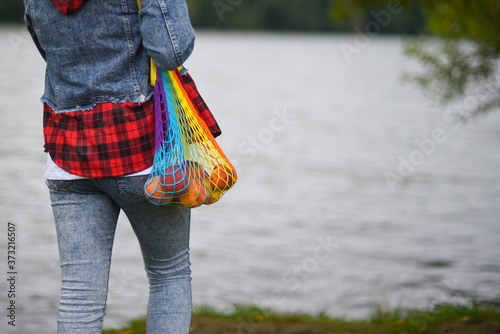 Rainbow colored eco friendly bag with peaches