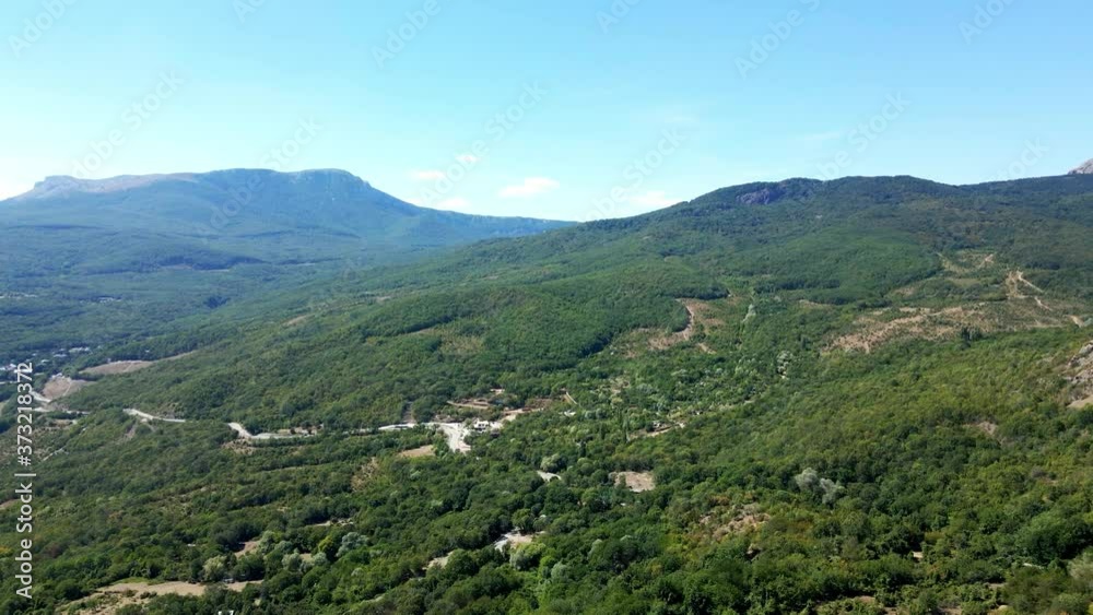 drone flight near Mount Demerdzhi in Crimea Russia during the day in summer in clear weather drone flight near Mount Demerdzhi in Crimea Russia during the day in summer in clear weather