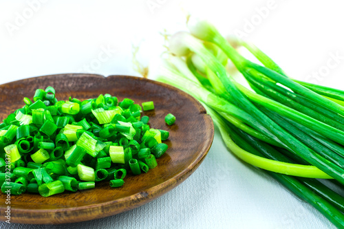 Spring Onion on a white background./ Bunch of fresh green onions (scallions) on white background.