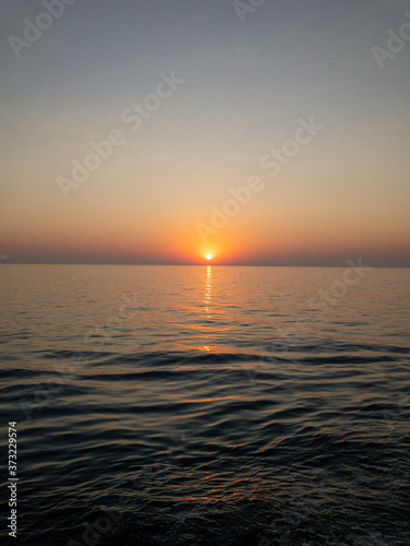 sunset over the ocean © Александр Лунев