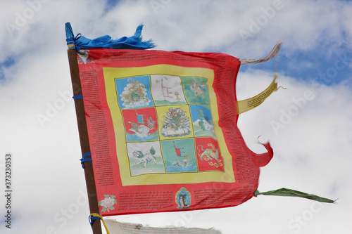 Tibetan darchor (vertical) prayer flags photo