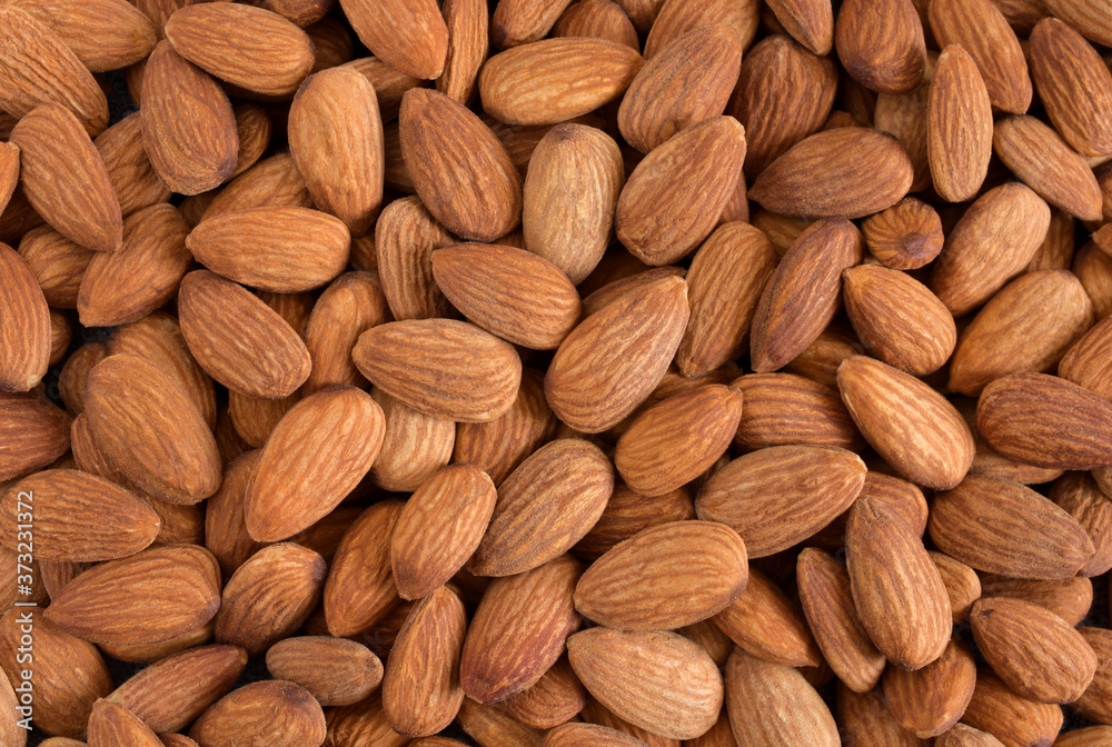 Almonds Background, Almond stacks for a background concept. Almonds Background, Almond stacks for a background concept.