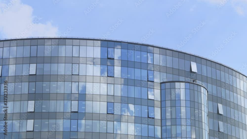 Time-Lapse Clouds Reflected in Glass Walls Time-Lapse Clouds Reflected in Glass Walls