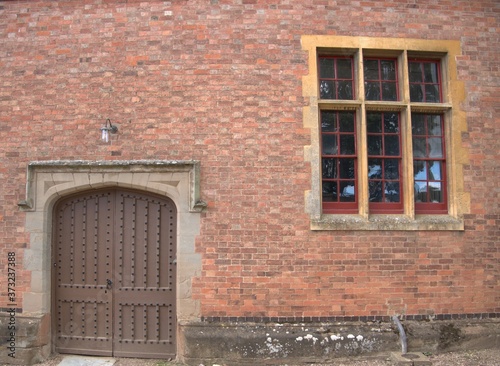 old brick wall with windows background