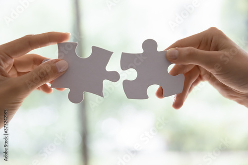 We give you exactly what you need. Male businessman making best offer to female customer, man and woman in love feeling perfect for each other, two diverse teammates doing work together, close up