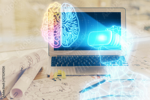 Computer on desktop with AR theme icon. Multi exposure. Concept of augmented reality.