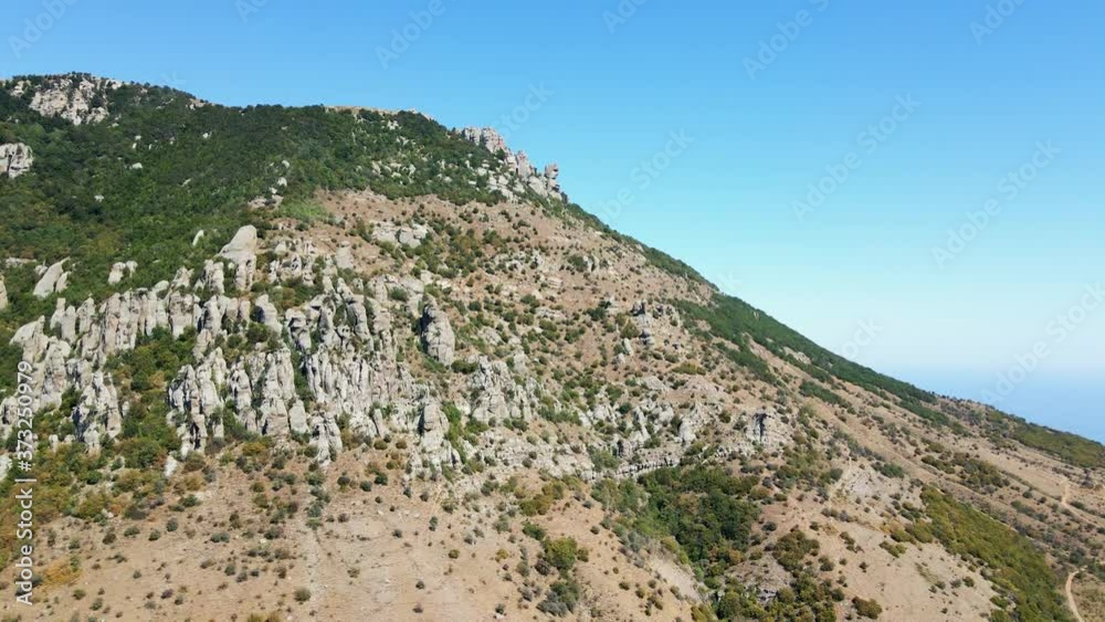 drone flight near Mount Demerdzhi in Crimea Russia during the day in summer in clear weather drone flight near Mount Demerdzhi in Crimea Russia during the day in summer in clear weather