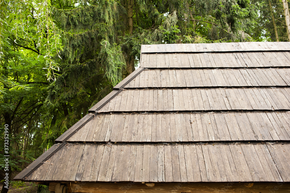 Fototapeta premium Old authentic wooden house with logs