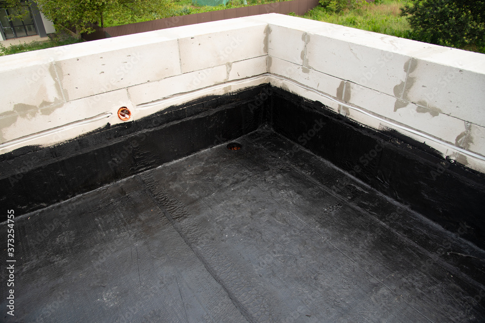 the terrace is covered with a layer of waterproofing roofing material the terrace is covered with a layer of waterproofing roofing material
