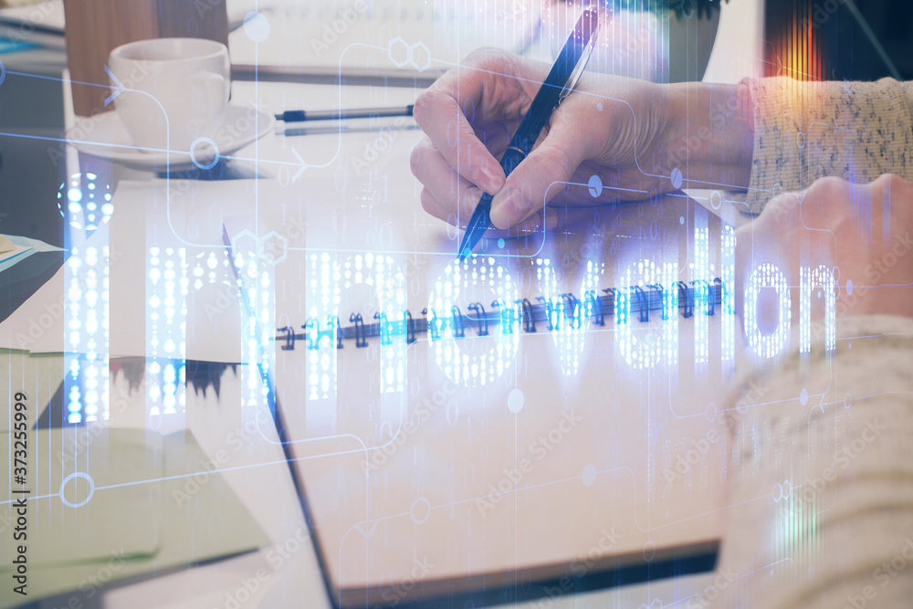 Double exposure of writing hand on background with data solution technology hologram. Ai concept. Double exposure of writing hand on background with data solution technology hologram. Ai concept.