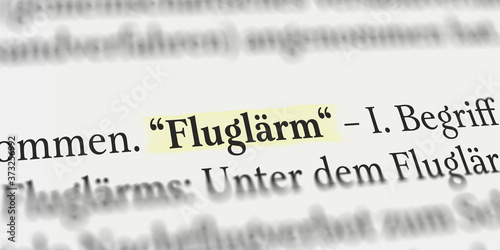 Fluglärm im Buch mit Textmarker markiert photo