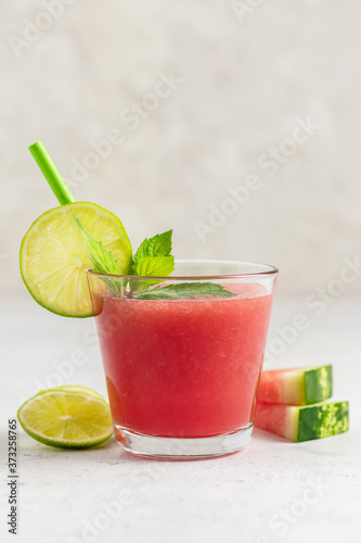 Summer party drink, watermelon lime mint smoothie. Space for text.