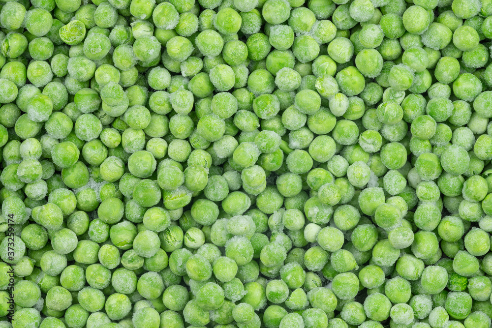 Frozen green peas texture background. ice peas background for food textures. Raw vegetables. Frozen green peas texture background. ice peas background for food textures. Raw vegetables.