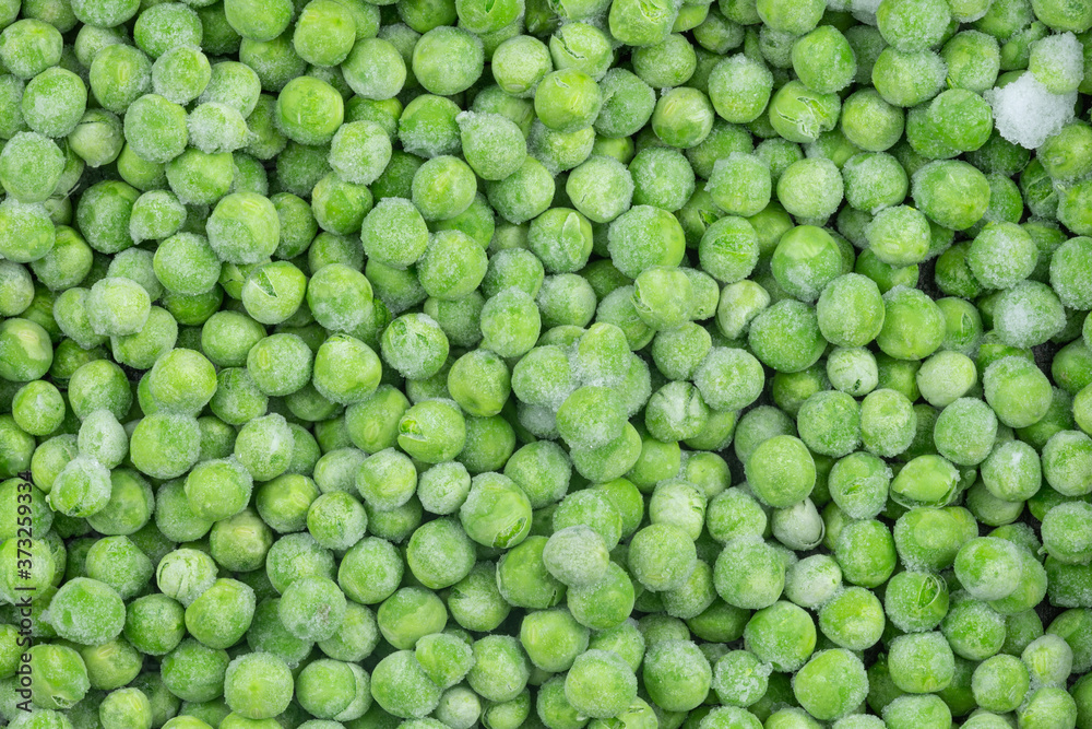 Frozen green peas texture background. ice peas background for food textures. Raw vegetables. Frozen green peas texture background. ice peas background for food textures. Raw vegetables.
