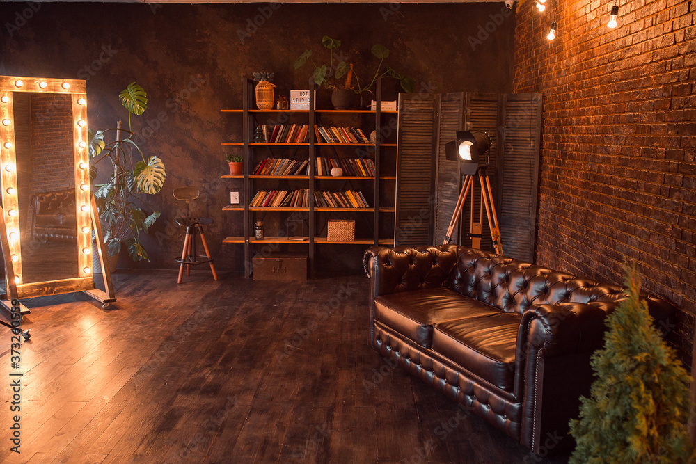 unusual loft interior. leather sofa. room in brown color. luxury livingroom unusual loft interior. leather sofa. room in brown color. luxury livingroom