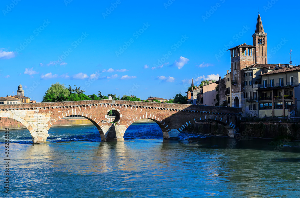 Bridge Pietra ( Ponte Pietra ). First finished in 100 BCE, this scenic Roman arch bridge was rebuilt after being destroyed in WWII. Verona, Italy