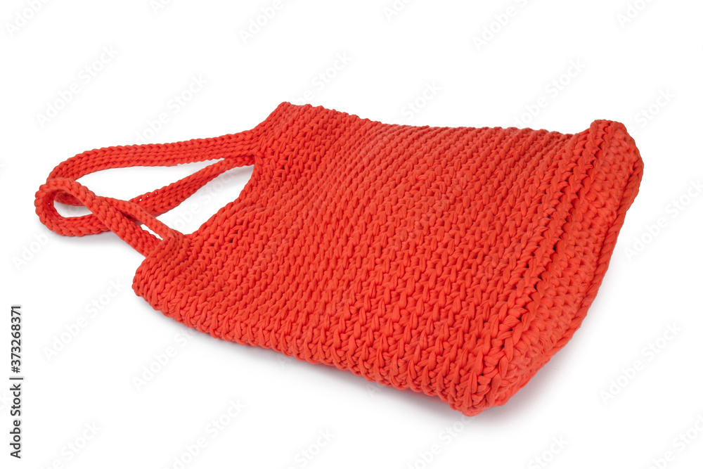 Braided orange bag on a white background Braided orange bag on a white background
