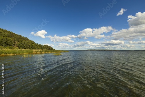 Beautiful Baltic sea view on blue sky with white clouds background. Beautiful summer nature backgrounds. Sweden, Europe.