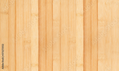 Natural light brown vertical wood background texture