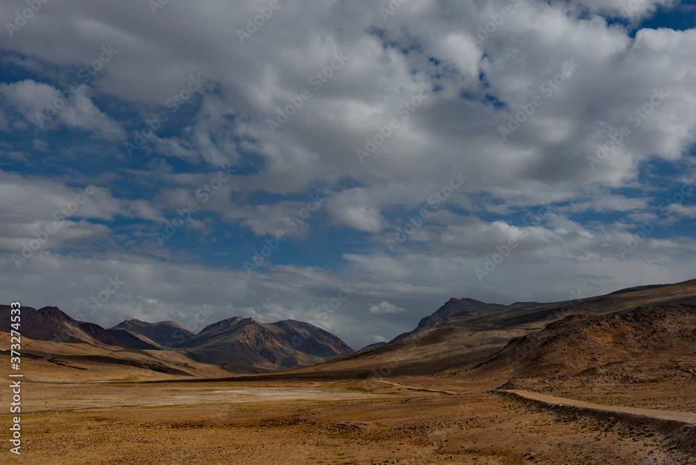 Central Asia. Tajikistan. High-altitude valleys of the North-Eastern section of the Pamir tract near the border with Kyrgyzstan. Central Asia. Tajikistan. High-altitude valleys of the North-Eastern section of the Pamir tract near the border with Kyrgyzstan.