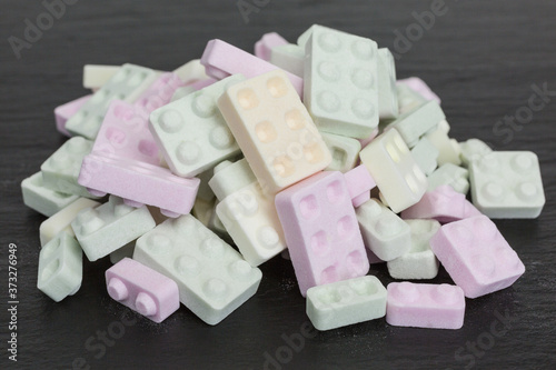 Tableau sur toile background of sweet sugar candy sticks with popping candy