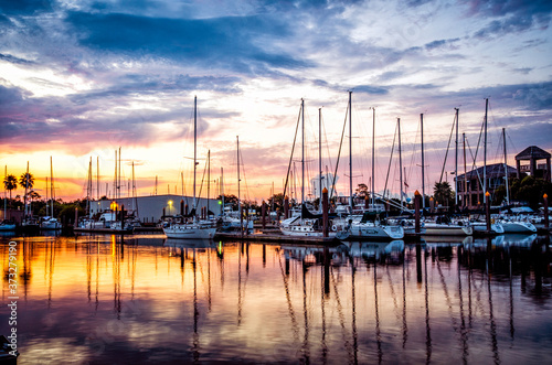 Fresh morning marina sunrise with sailboats and calm water  © Fred Facker