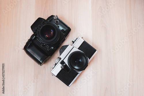 classic film cameras on a wooden background