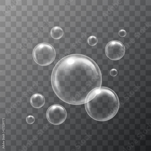 Realistic soap bubbles. Water bubbleson isolated on transparent background. Vector illustration.