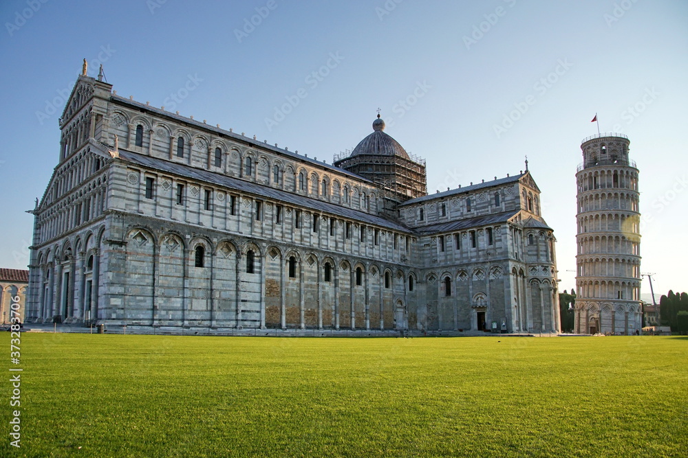 View of the Pisa Cathedral with the Leaning Tower of Pisa in Piazza dei Miracoli of Pisa, region of Tuscany, Italy