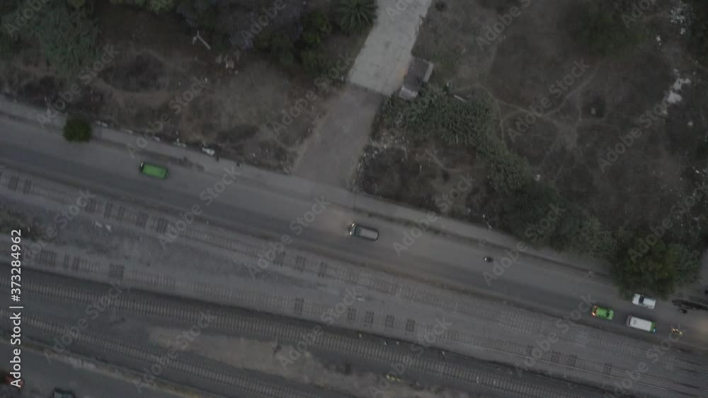 Leaving the road, next to train tracks