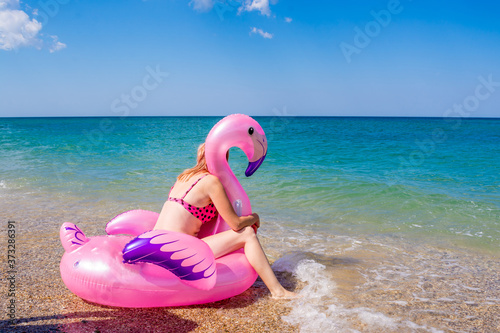 Girl with a circle on the sea