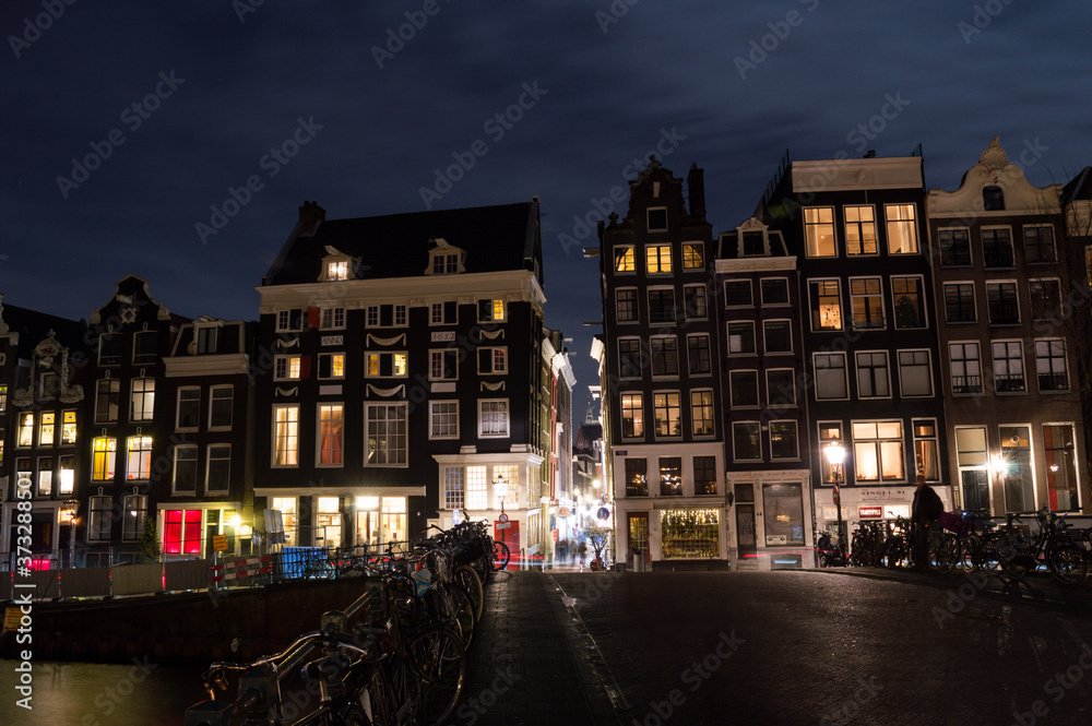 Traditional Dutch Canal Houses during New Year’s Eve in Amsterdam, Netherlands