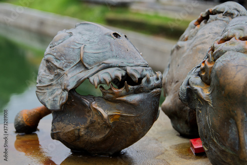 Fish schulpture on the Butcher's bridge in Ljubljana, Slovenia photo